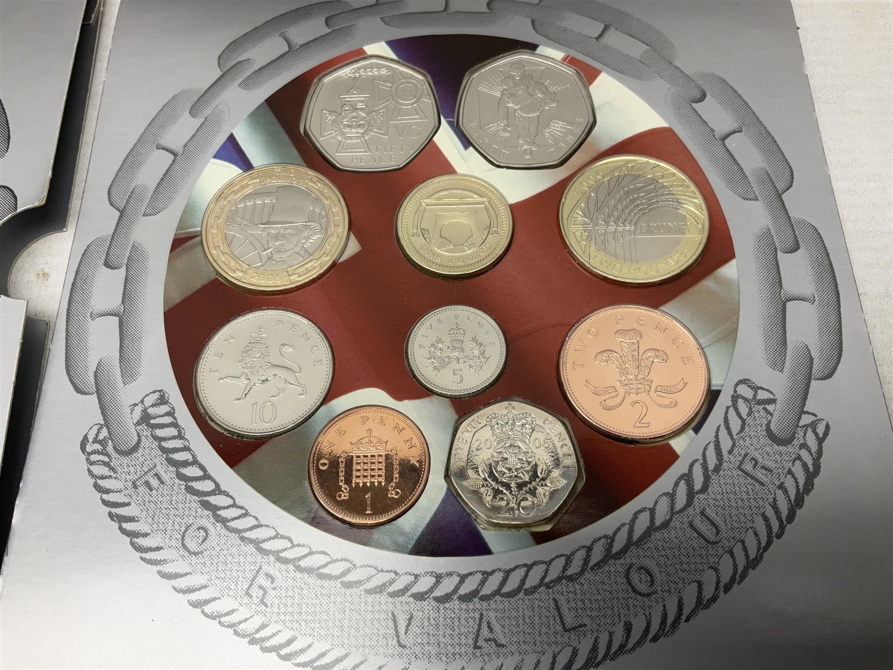 The Royal Mint United Kingdom 2006 brilliant uncirculated coin collection, in card folder and a part set of The London Mint Office 'The Platinum Wedding Anniversary Photographic Collection' coins