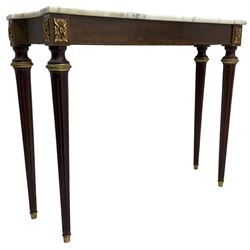 Louis XVI design console table, shaped marble top over plain frieze with gilt metal foliate mounts, raised on fluted tapering supports