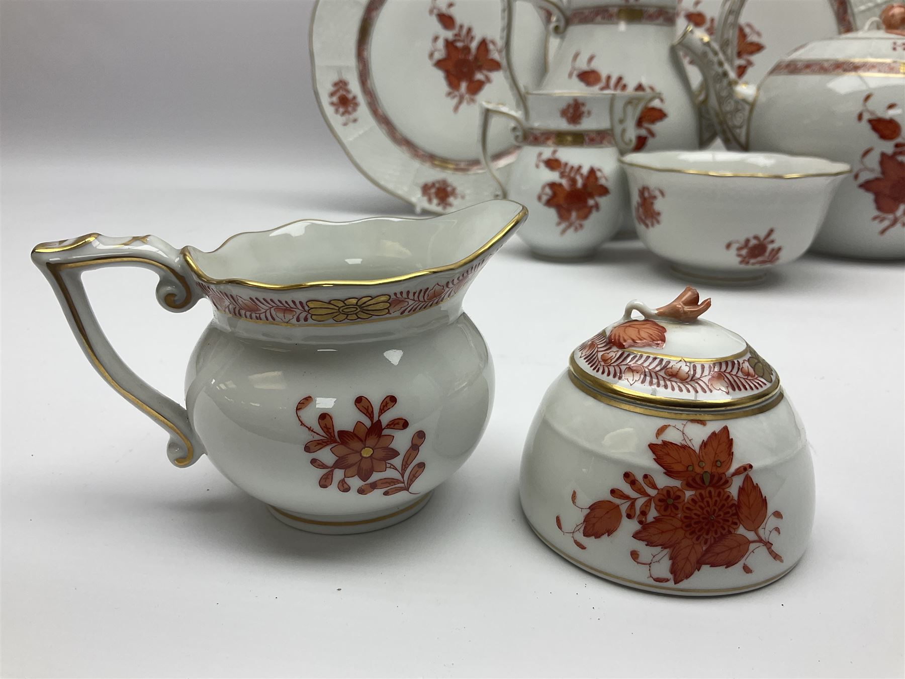 Herend Chinese Bouquet Rose pattern tea service comprising teapot, coffee pot, open sucrier, six cups and saucers, six tea plates, cream jug and stand, milk jug, two teabag holders, preserve pot, two leaf shaped dishes, four egg cups, salt & pepper pots, pair side plates and another plate