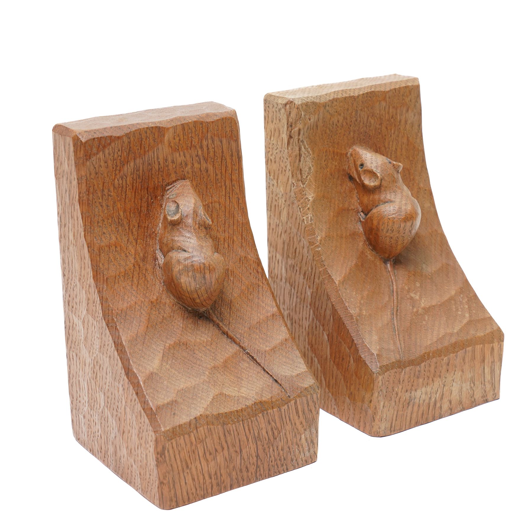 Mouseman - pair of adzed oak bookends with carved mouse signature H15cm by the workshop of Robert Thompson, Kilburn
