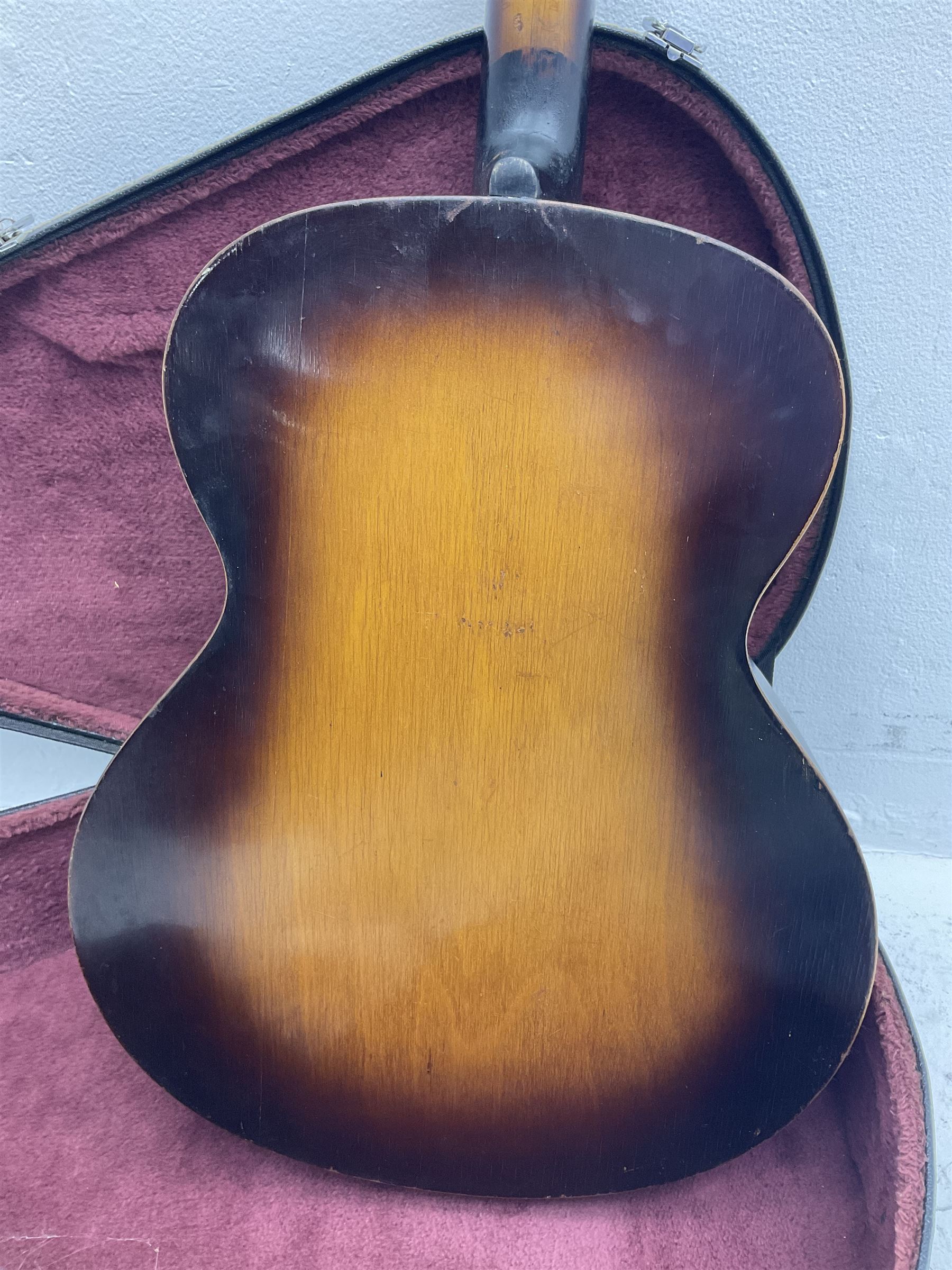 1950s Framus arch top acoustic guitar with sunburst finish and Framus logo to top, No.1937 L104cm; in hard carry case.
