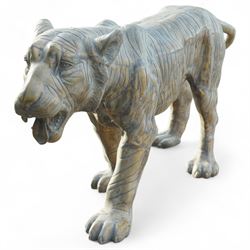 Pair of Chinese cast bronze tiger figures, one in a seated resting pose and the other advancing with open mouth, both with incised striping and aged bronze patina
Seated tiger (H 54cm, W 63cm, L 129cm)
Stood tiger (H 76cm, W 40cm, L 176cm) 