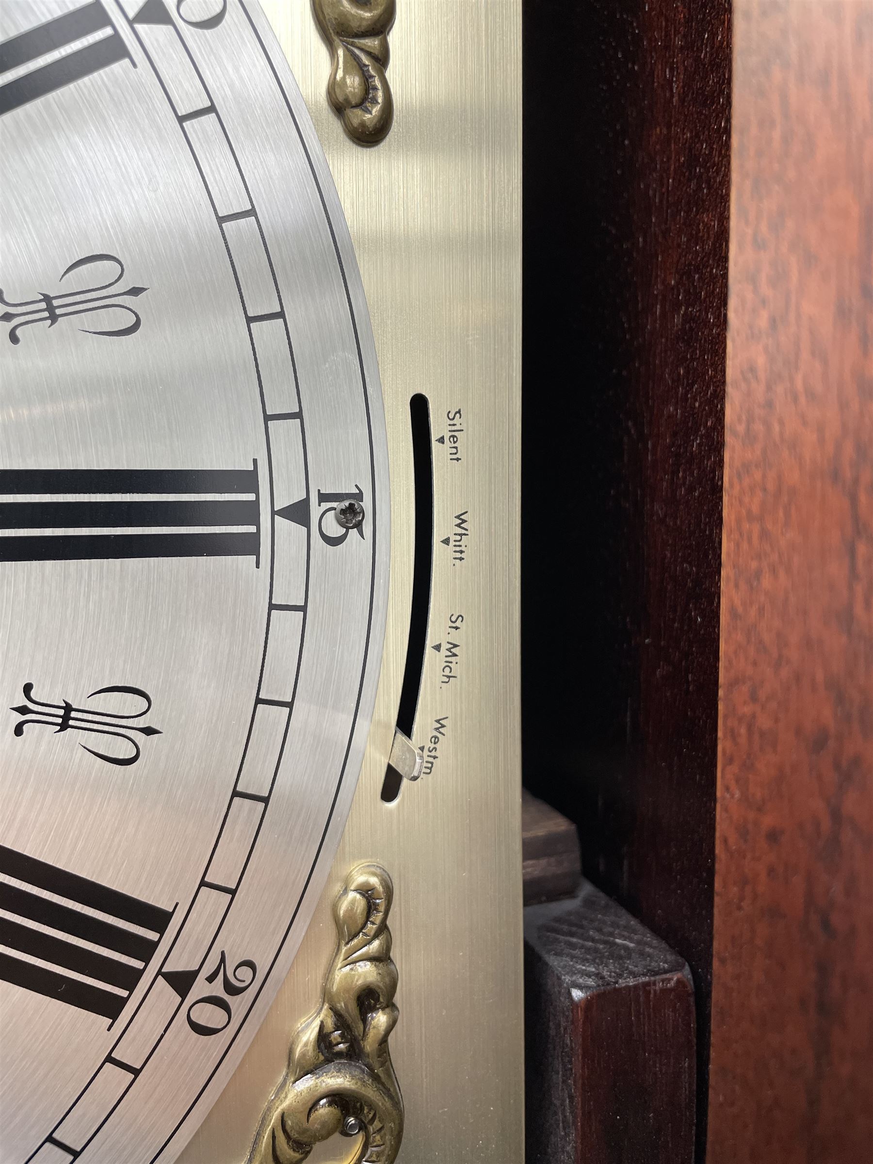 Fenclocks Suffolk - contemporary mahogany longcase clock, stepped arch hood with plain pilaster columns, moon phase dial and silvered Roman chapter ring, with chime set/silent lever, triple weight driven quarter chiming movement