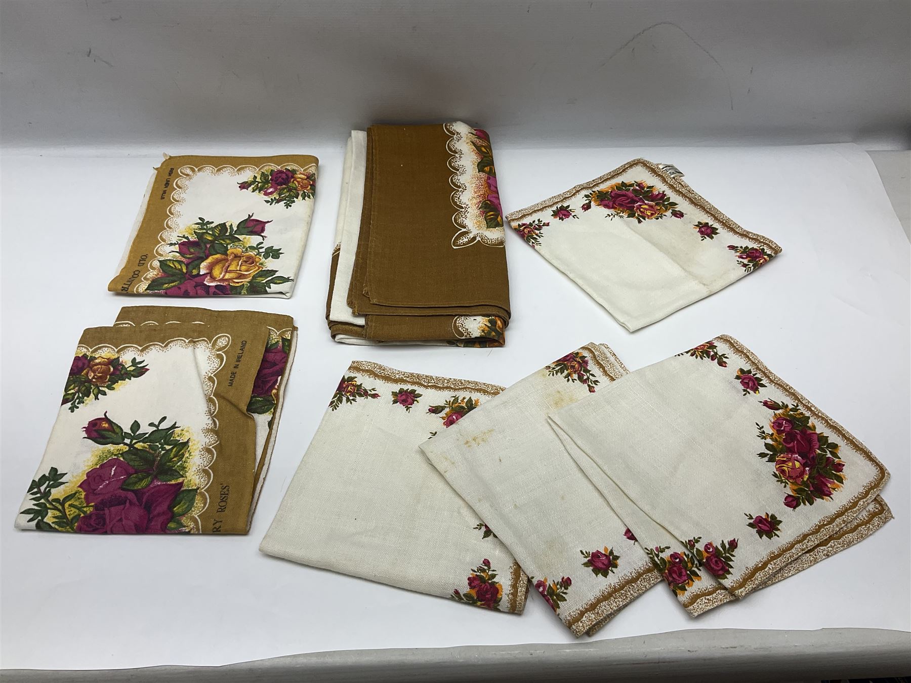 Royal Albert Country Roses pattern part tea and dinner service, to include teapot, four cups and saucers, four dessert plates, cake plate etc, (41)