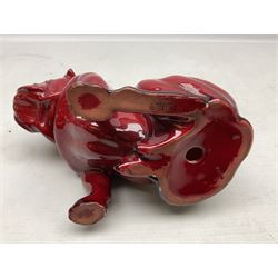 Royal Doulton Flambe figure of a Bulldog, modelled seated, model no 135, with printed maker's mark and K and impressed 135 beneath, H13.5cm