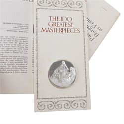 John Pinches 'The 100 Greatest Masterpieces' set of one hundred silver medallions, each on presentation card with information leaflet, together with the corresponding wooden display cabinet
