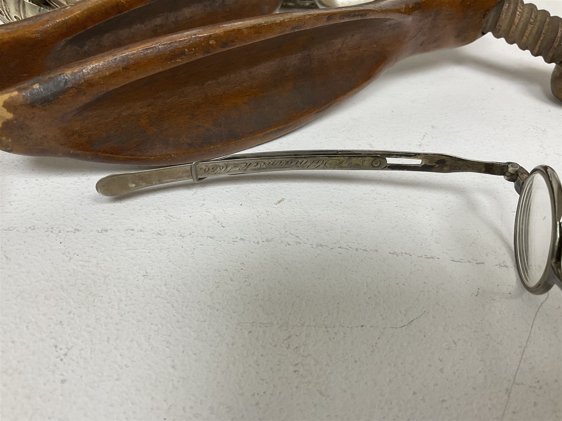 Quantity of mid 19th century and later photographs to include cartes des visites,  together with a small oval mirror, early 20th century clock, Bakelite cigarettes box, three hallmarked silver spoons, pair of Georgian spectacles with extending arms, silver and gold Plated reproduction icon, other silver plate and metal ware etc