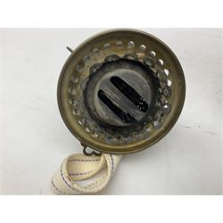 Victorian table oil lamp with black glazed stepped circular base, reeded brass column, moulded pink glass reservoir, duplex burner and frilled rim frosted glass shade with clear glass chimney H69cm