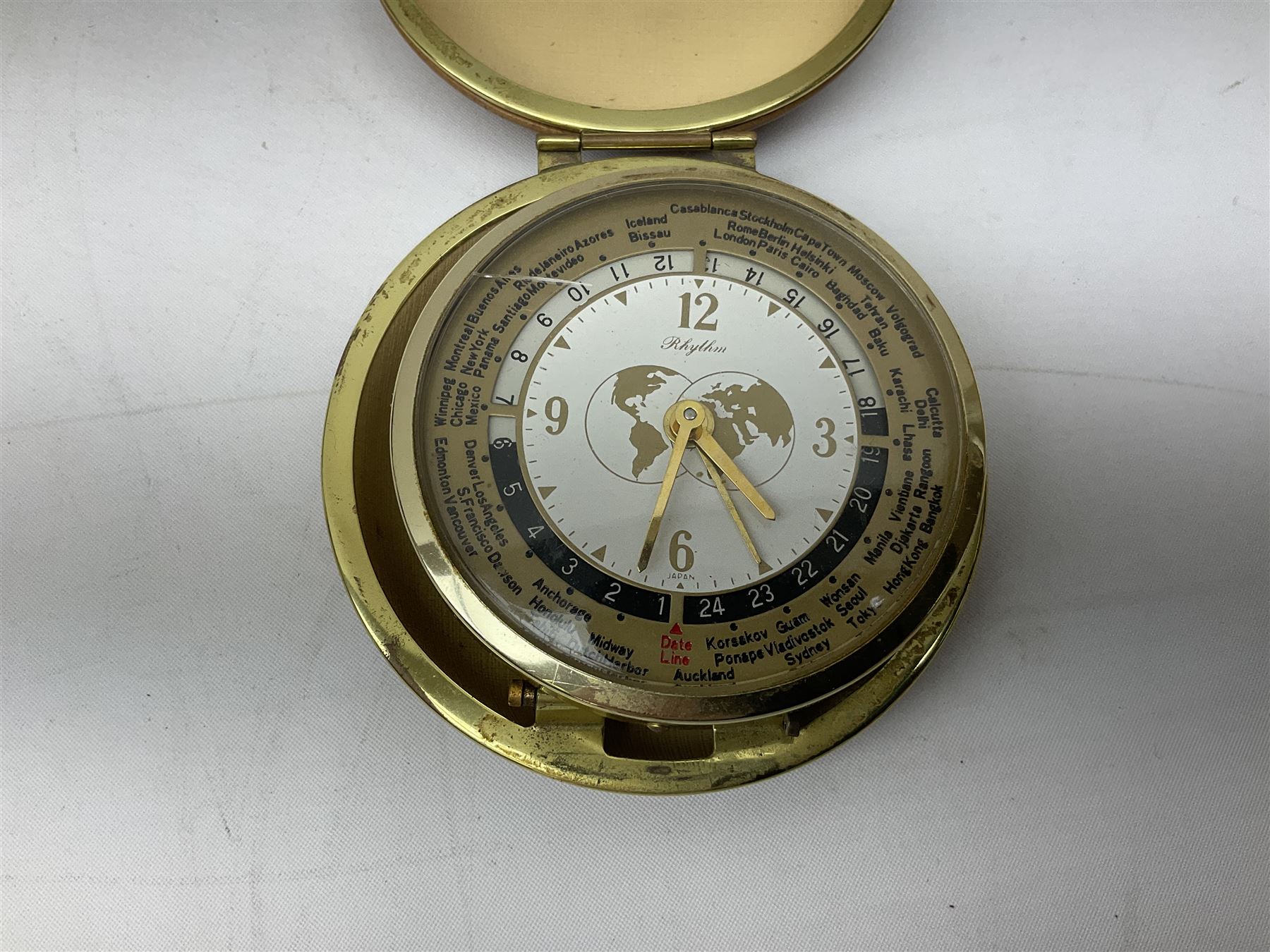 Silver 1969 Cunard RMS Queen Elizabeth maiden voyage commemorative medallion, in original Slade, Hampton & Son case with certificate, two Stratton R.M.S Queen Elizabeth mirror compacts, Stratton R.M.S Queen Mary compact, mid 20th century P&O Canberra Round World Voyage miniature globe, S.S Oriana ash tray modelled as a barrel, Norah Wellings sailor doll, and other maritime and shipping memorabilia 