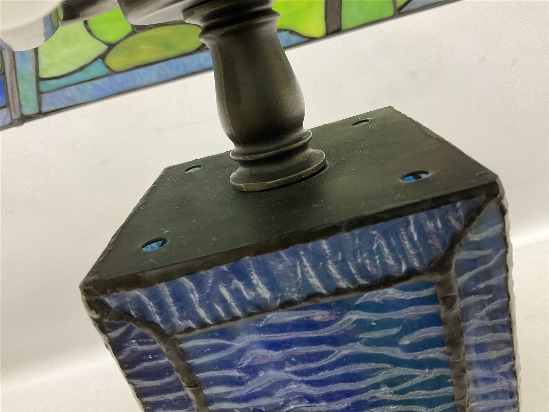 Tiffany Pond Lily style table lamp and shade with leaded panels of green, pink and rippled blue water effect ground, raised upon brushed metal base, H50cm