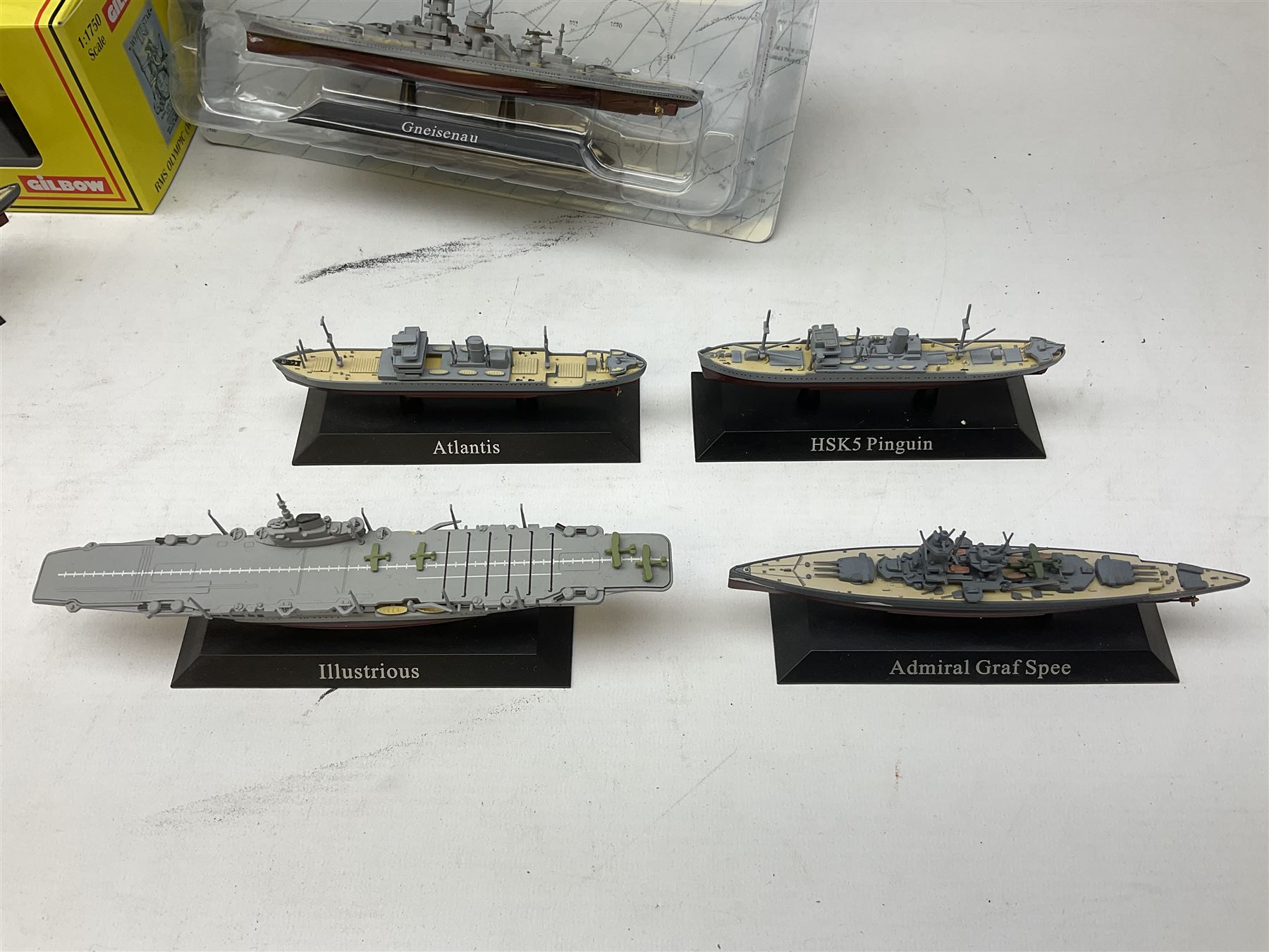DeAgostini Atlas Editions - HMS Anson, HMS Exeter, HMS Renown, HMS Nelson, HMS Warspite, HMS Hood, Bismark, and USS Saratoga, all boxed; DeAgostini - Gneisenau, Blucher, and Prinz Eugen, packaged; together with ten further DeAgostini battleships, unboxed, and a Gilbow RMS Olympic model, boxed (qty)