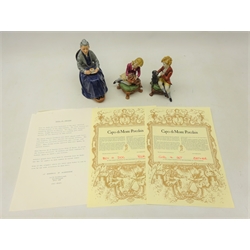  Royal Doulton figure 'The Cup of Tea' and a pair of Capodimonte figures of a girl and boy seated with a dog and cat, with certificates (3)  