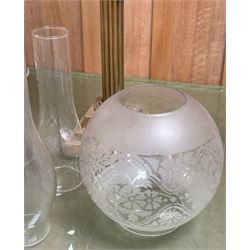 Edwardian columnar brass oil lamp (H73cm) together with another oil lamp, two etched glass globes and four glass flutes (8)  - COLLECTION BY APPOINTMENT FROM: The White House, Thirsk Road, Easingwold, York, YO61 3NF - CALL 01723 507111 TO ARRANGE