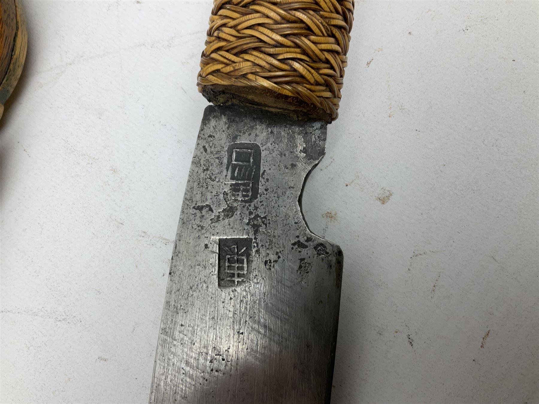 Malaysian parang survival knife the 29cm steel blade with character marks, cane bound teak grip carved with a stylised turtle head to the pommel, with matching teak scabbard L46cm overall
