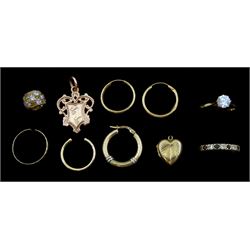 9ct gold jewellery including single stone cubic zirconia ring, blue stone set ring, rose gold fob pendant, stone set charm, odd hoop earrings, wedding band and a gilt heart locket 