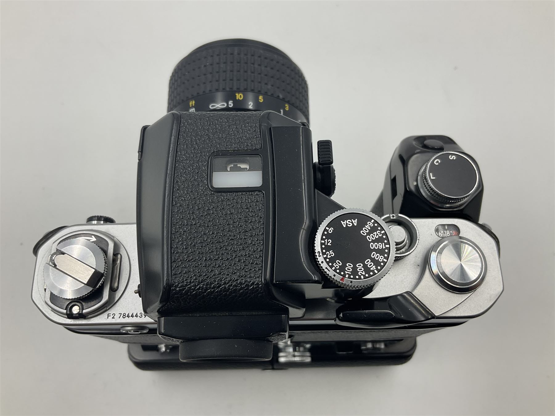 Nikon F2A Photomic camera body, serial no. 7844439, with 'Nikon Zoom-NIKKOR 35-70mm 1:3.5-4.8' lens, serial no. 5352031, Nikon MD1 Motor Drive, serial no. 208608 and Nikon MB1 battery pack