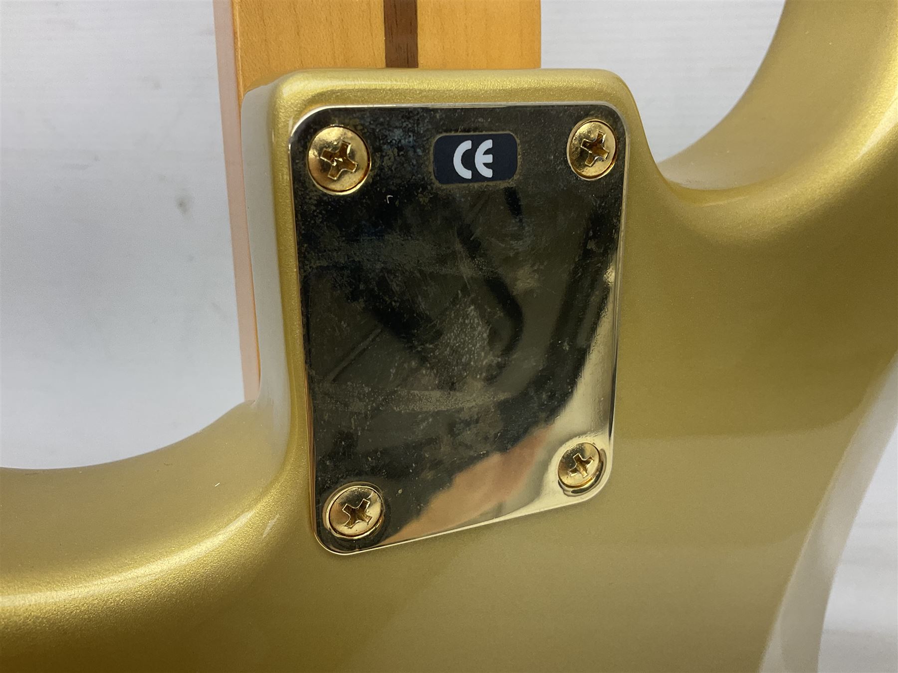 Fender Stratocaster 50th Anniversary 2004 metallic gold electric guitar; serial no.MZ4116369; L98cm; in Spider fitted case with owners manual and other paperwork, strap and belt buckle etc