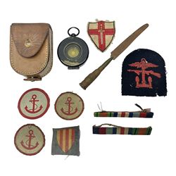 WW1 Short & Mason Ltd 'The Magnapole' black japanned brass field compass in leather carrying case; WW1 trench art paper knife inscribed Dixmude; and small quantity of cloth badges etc