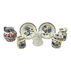 Pair of Mason's Ironstone plates decorated in the jardinière pattern, together with Mason's set of three graduated jugs in the Regency pattern, ironstone jug decorated in the Imari palette and Portmeirion Parian ware jug moulded with cherubs