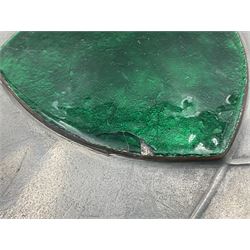 Liberty & Co Tudric pewter Bollelin tray, designed by Archibald Knox, of circular form with shaped edge, cast in relief with foliate tendrils surrounding a green enamel cartouche, impressed beneath Made by Library & Co English Pewter 044, D25.5cm