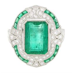 Platinum emerald and diamond milgrain set dress ring, single octagonal cut emerald of 2.40...