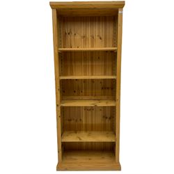 Traditional pine open bookcase, fitted with four adjustable shelves