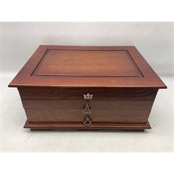 Waltmann und Sohn part canteen of stainless steel and gilt cutlery, the stained wood case with hinged lid above two fitted drawers, L48cm