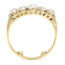 Early 20th century 18ct gold diamond ring, set with five graduating old cut diamonds and diamond accents, total diamond weight approx 1.55 carat