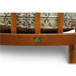 Ercol - elm dining chairs, a set of five comprising four side chairs and one '370' armchair, all with hoop backs formed with slender spindle splats, shaped solid elm seats, the armchair with curved out-swept arms, raised on splayed turned supports united by stretchers