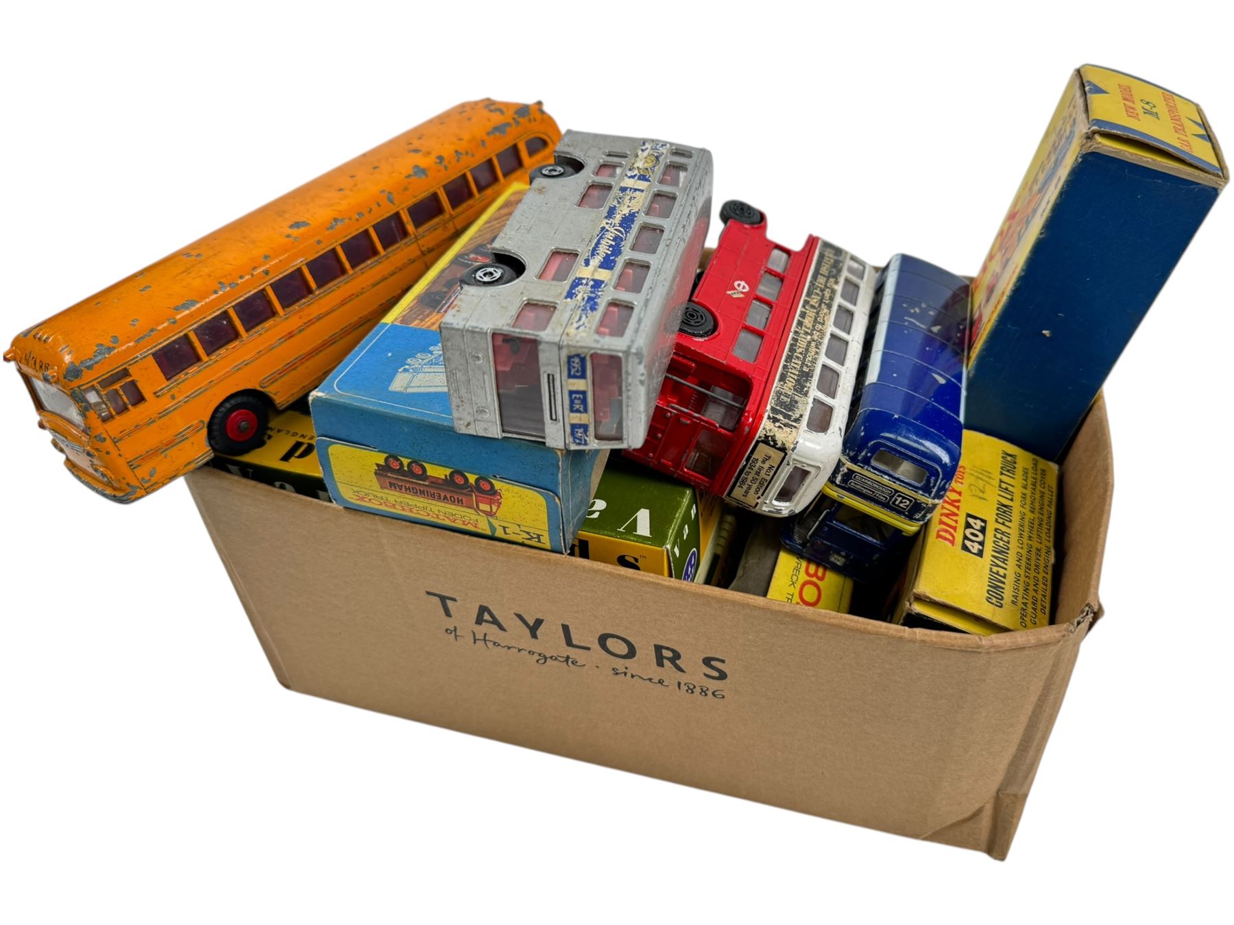 Matchbox Major Pack Car Transporter, Dinky Toys Conveyancer Fork Lift Truck, four Vanguards 1:64 diecast vans/lorries and two Matchbox lorries, all boxed, together with four unboxed diecast buses including Dinky Toys Wayne School Bus
