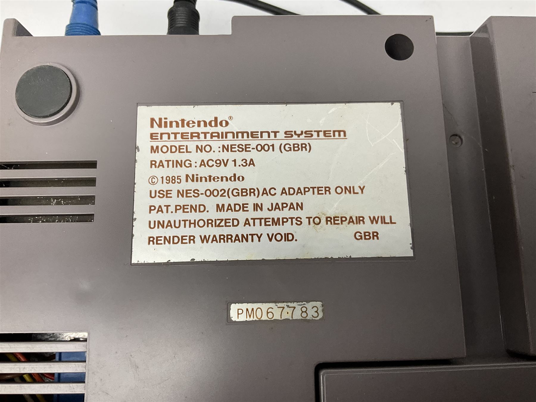 Nintendo Entertainment System (1985) console with two controllers, accessories and instruction booklet. NES Games ‘Duck Hunt’ with Nintendo Zapper gun, ‘Pinball’ and ‘Super Mario Bros.’, all with original sleeves and instruction booklets. NES game ‘Super Mario Bros. 2’ cartridge only