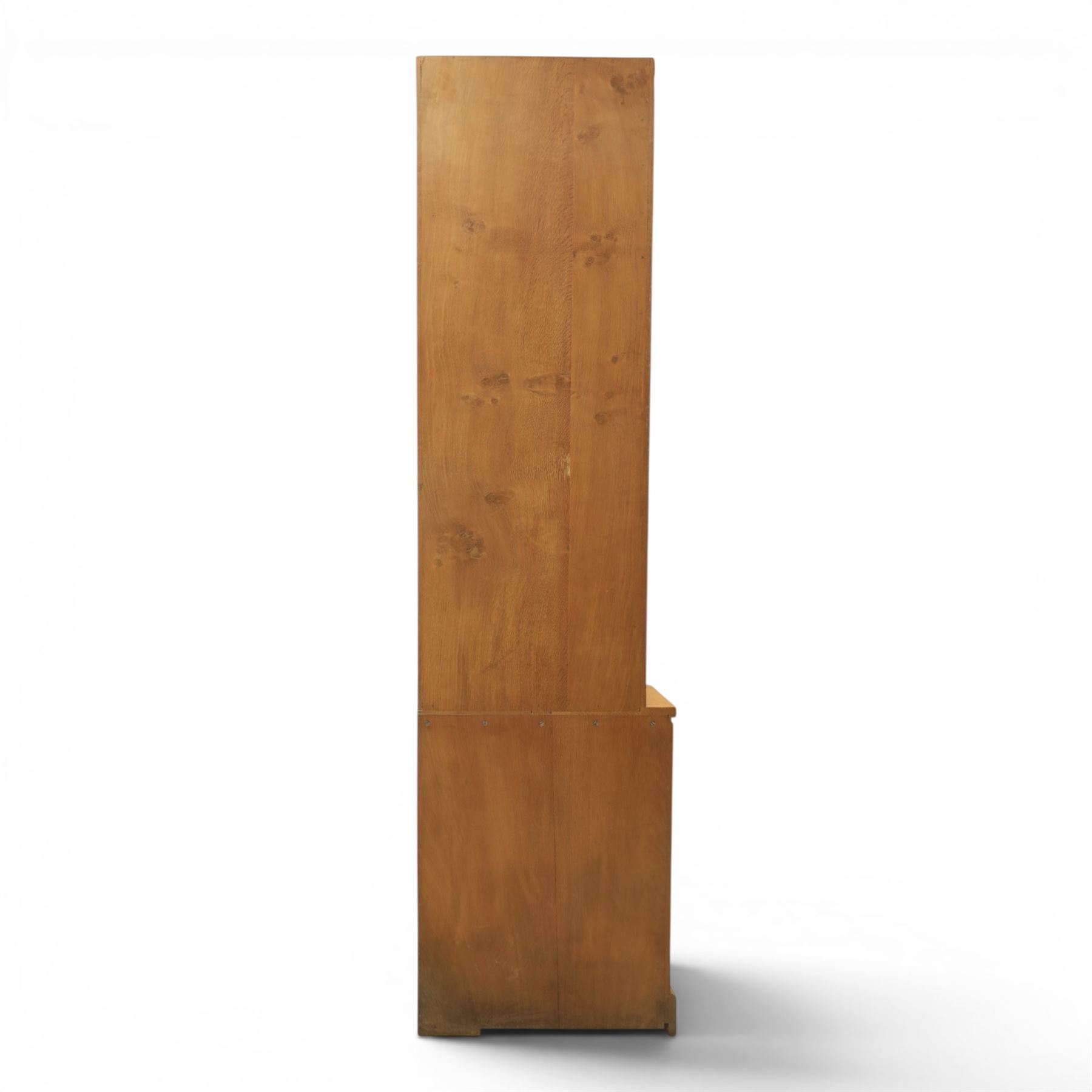Mouseman - oak floor standing corner cabinet, scalloped cornice above a leaded glass cabinet, blackened metal hinges and latches, with carved mouse by the workshop of Robert Thompson of Kilburn