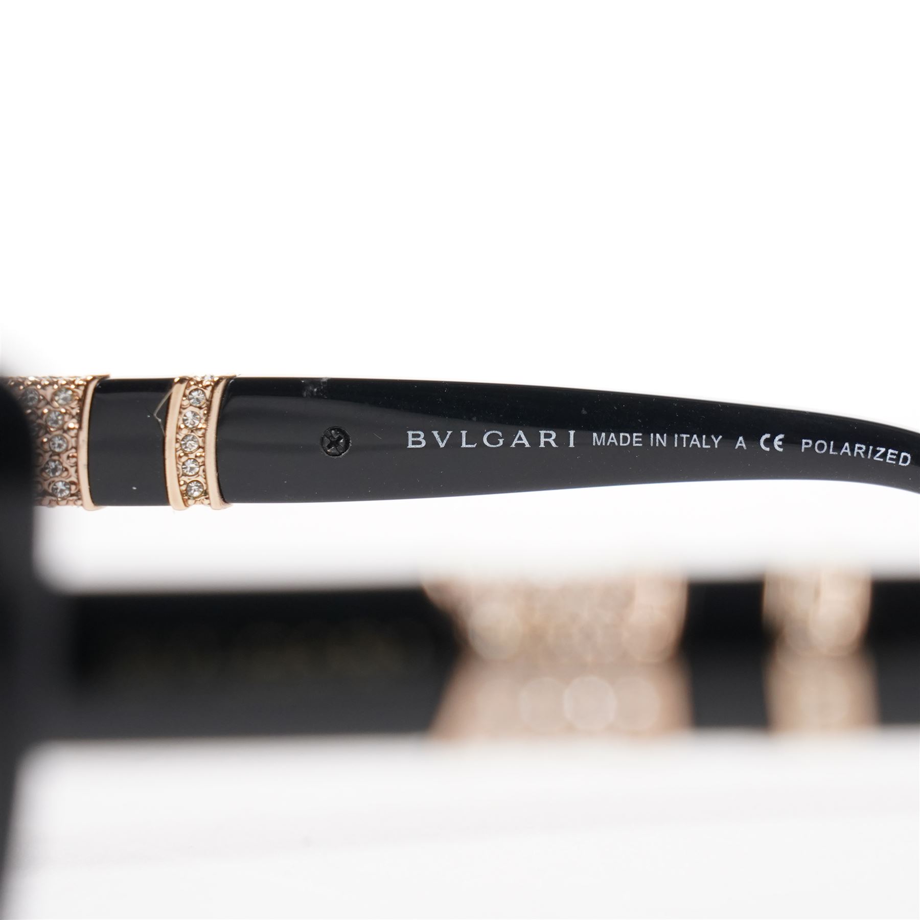 Bulgari - pair of oversized cat-eye sunglasses, with gradient tinted lenses in a black frame, the temples and arms with gold-tone hardware inset with pave-jewelled hinge detail, with original cloth pouch, hard leather case and box