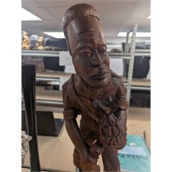 Carved wooden figure of a man holding a pineapple, together with a silver plated candelabrum, cut glass basket, etc, figure H64cm