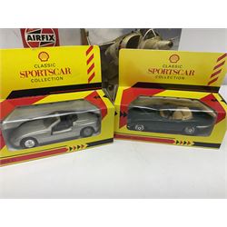 Thirteen unboxed Corgi Aviation Archive or similar die-cast models of aircraft, most with stands; Airfix 1:72 scale construction kit for BAe Harrier GR3; and two boxed Shell Collection die-cast models of cars