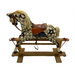 Collinson - early 20th century carved wood rocking horse, on trestle base with tack