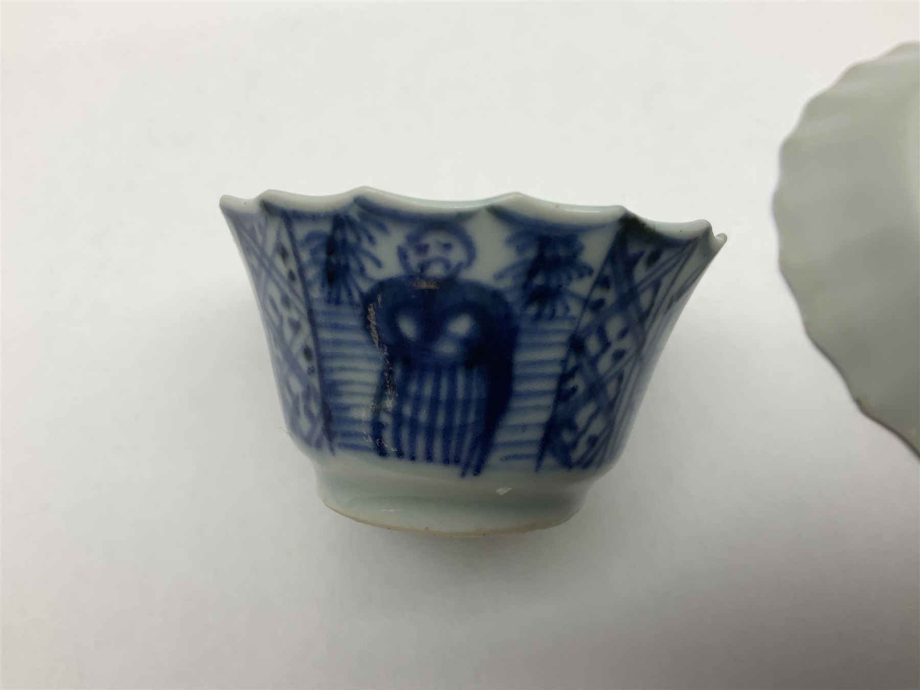 Chinese Kangxi blue and white fluted tea bowl and saucer 