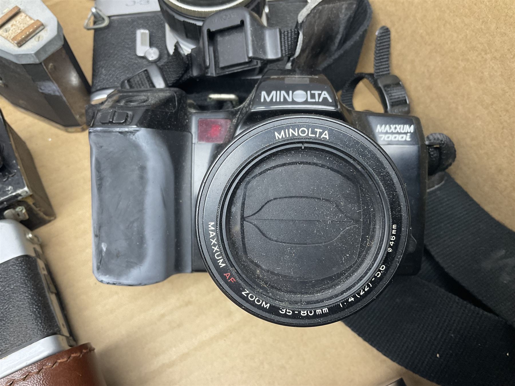 Large collection of cameras to include folding and SLR examples, including Rank Aldis, Agfa, Yashica, etc