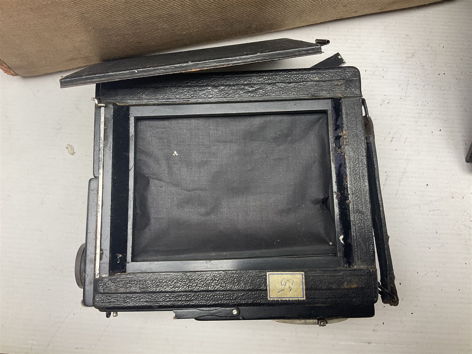 Contessa-Camera Werke folding camera, together with Hirrlinger folding camera, additional plates, two tripods and other accessories 