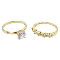 Gold single stone cubic zirconia ring and a gold five stone cubic zirconia ring, both hallmarked 14ct