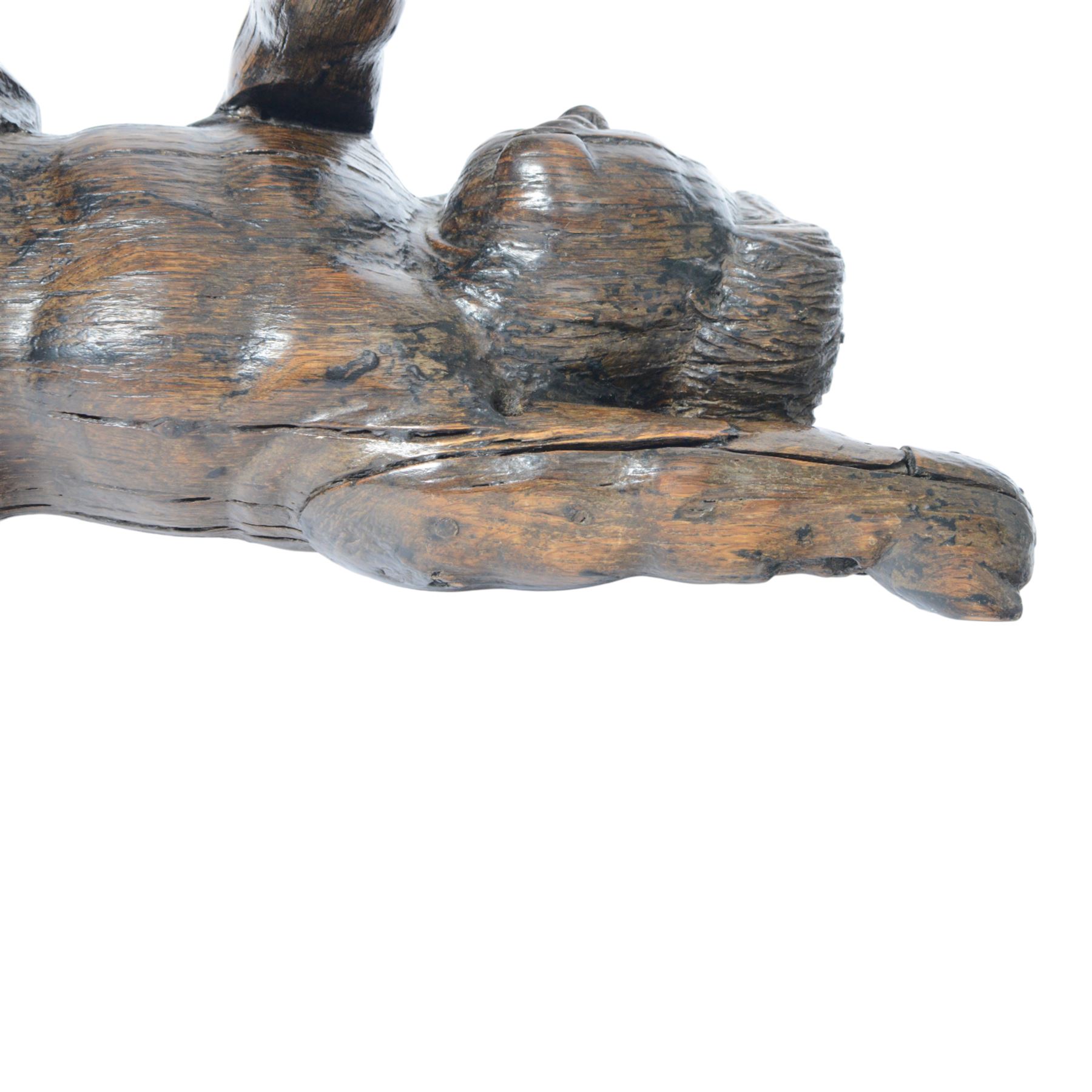 17th century carved figure of a putto, modelled with arms upstretched and head turned, approximately H64cm W23cm D27cm