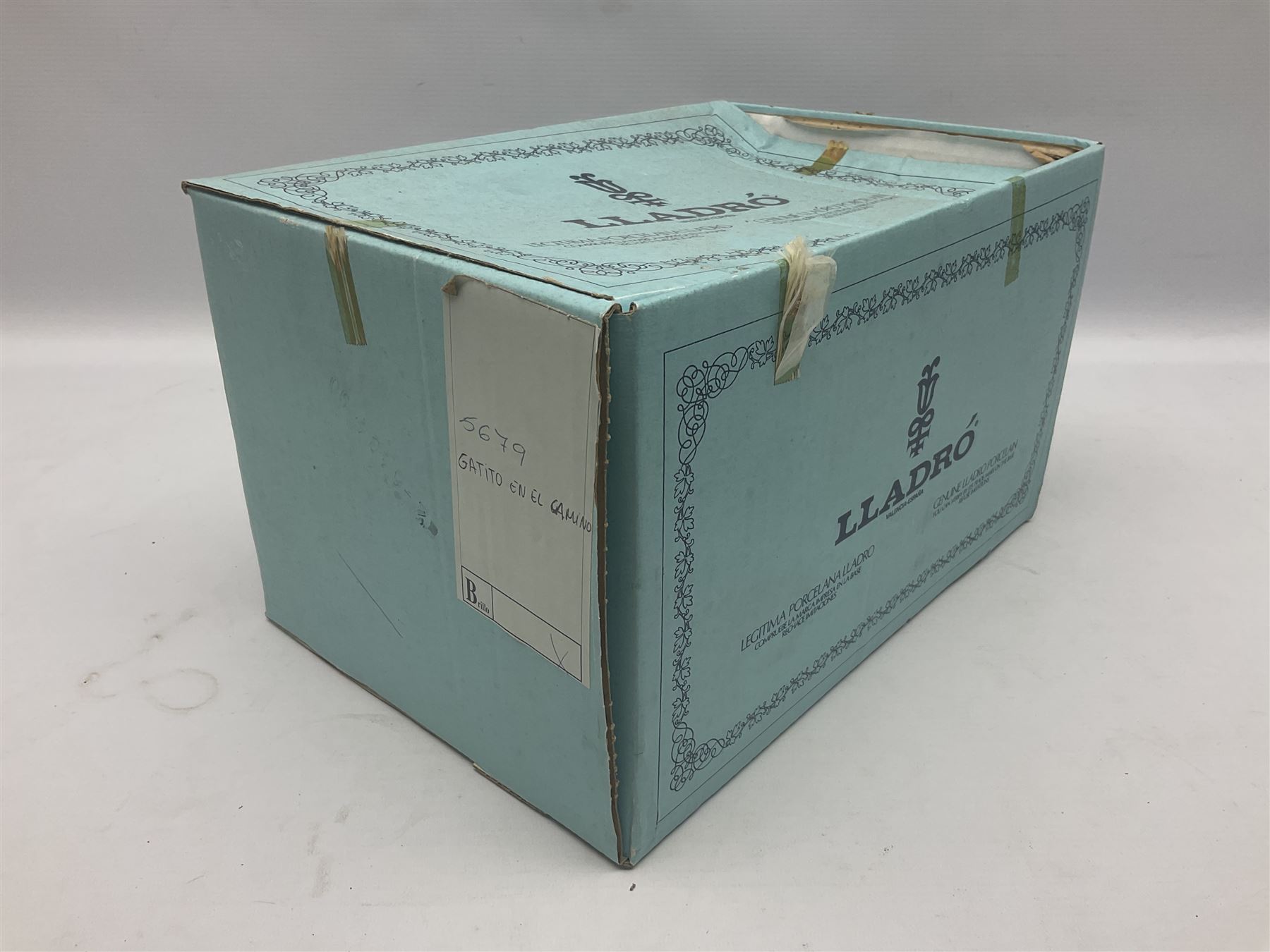 Lladro figure, In No Hurry, modelled as a girl on a tricycle, sculpted by Francisco Polope, with original box, no 5679, year issued 1990, year retired 1994, H15cm