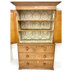 Victorian scumbled pine linen press cupboard, projecting cornice above two doors enclosing two shelves above three graduating drawers 
