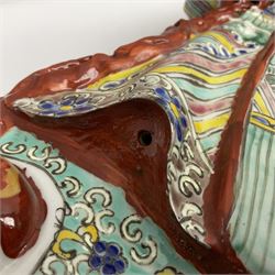 Chinese Republic Period porcelain figure, modelled as Shoulao, wearing elaborately enamelled robes decorated with peaches and flower heads, with impressed mark beneath, H55cm