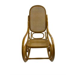 Early to mid-20th century Michael Thonet design bentwood rocking chair, with cane seat and back