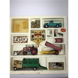 Corgi Toys Agricultural Gift Set No.5 containing Massey-Ferguson 165 Tractor with shovel and skip and churns attachment with two churns, Tandem disc harrow, farm tipper trailer with raves, Land Rover, Dodge Kew Fargo truck with four cattle and four pigs, farm worker and dog,  eleven large sacks and five small sacks, boxed