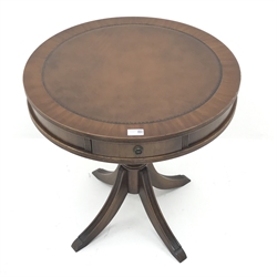  Regency style mahogany circular drum table, inset leather top, two frieze drawers, single column support on three out splayed feet, D61cm, H64cm  