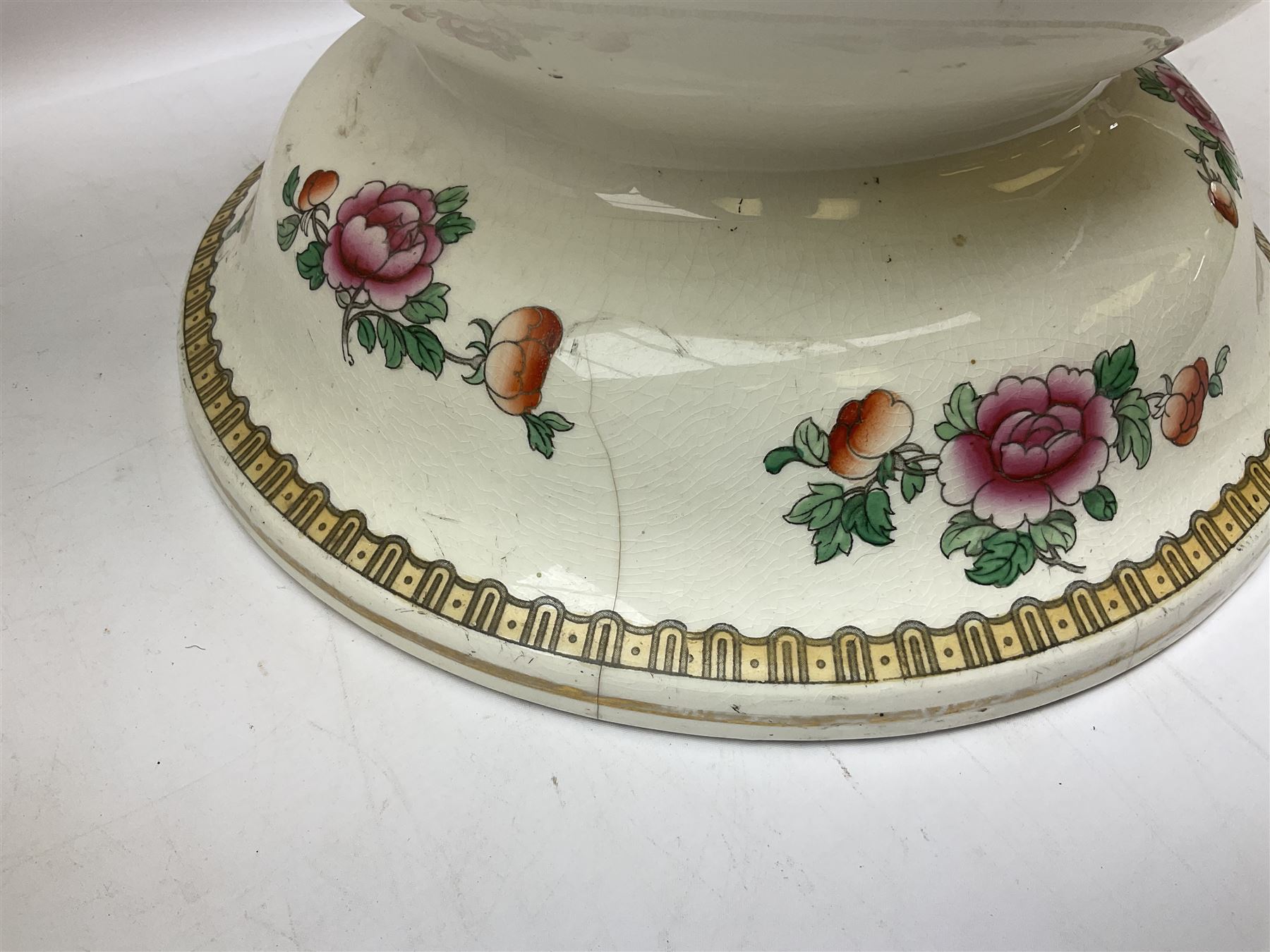 Large ceramic Jardiniere on stand, decorated with an oriental pheasant perched upon branches blossoming with peonies and foliage on white ground, overall H99cm