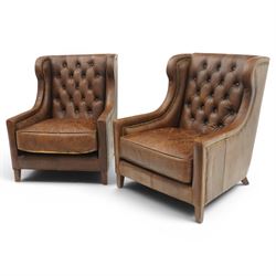 Timothy Oulton - pair of wingback armchairs upholstered in back-buttoned chocolate brown leather with loose seat cushion, raised on square tapering feet