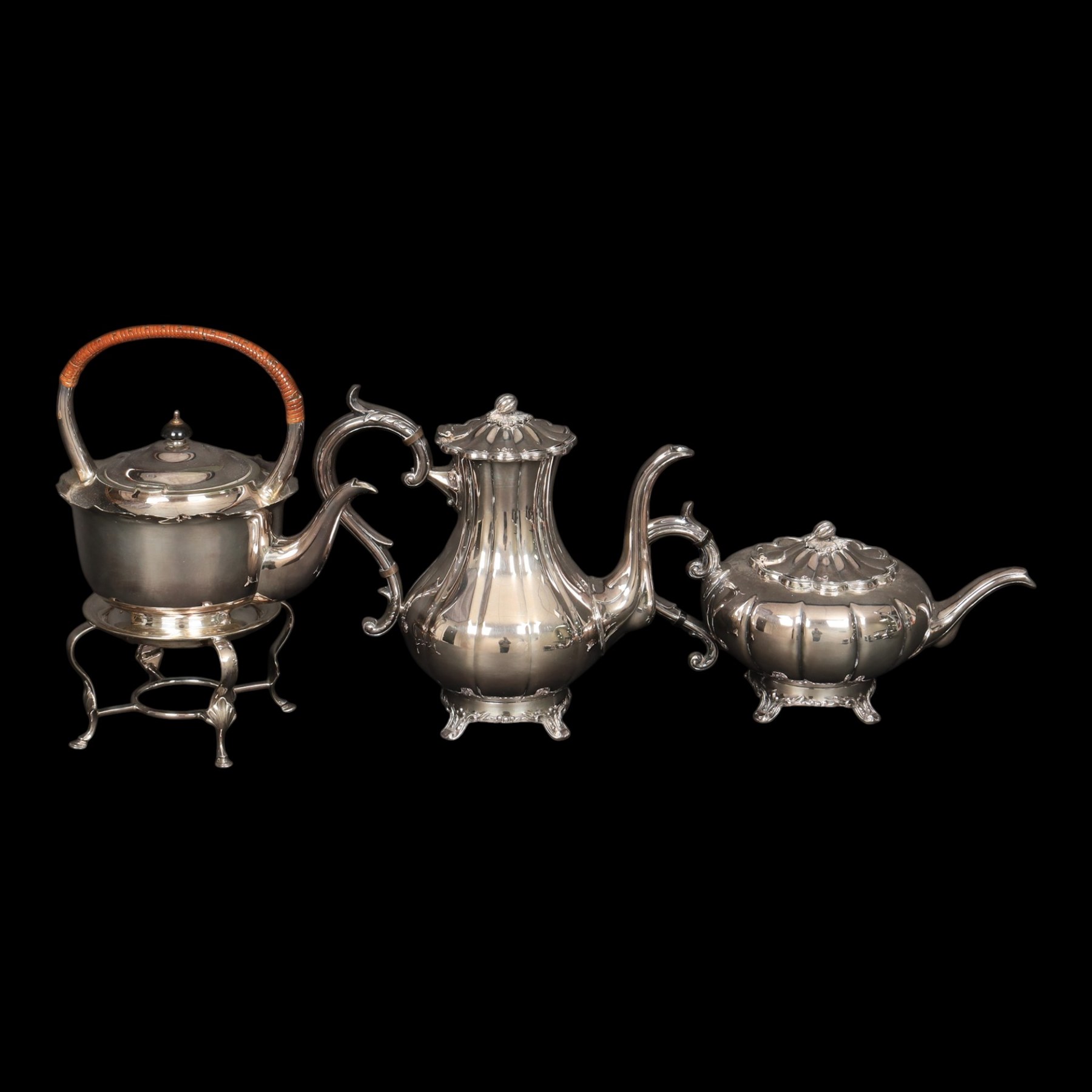 Silver plated four piece melon-shaped tea service by Viners Sheffield, comprising teapot, hot water jug, milk jug and covered sucrier, together with another silver plated tea service 